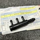 Genuine NOS Johnson Evinrude Manifold OEM BRP 395540